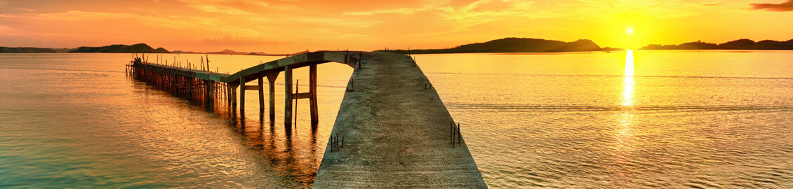dock over water sunset